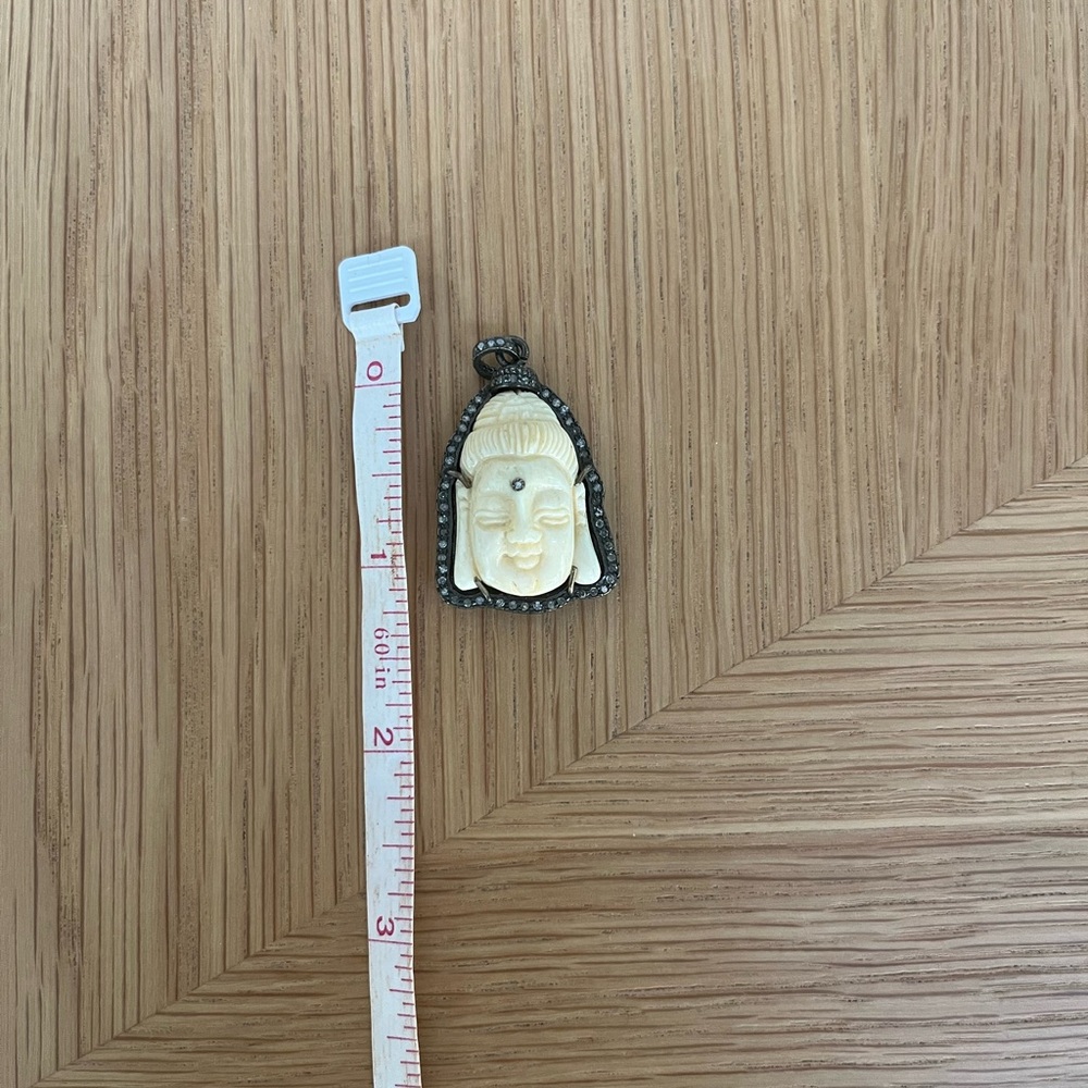 Elegant Cream and Black Buddha Brooch